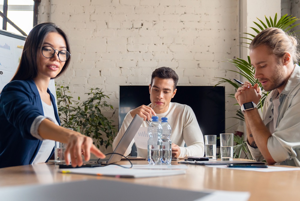 Business people discussing new project in office. Team of business professionals having a meeting business meetings apac