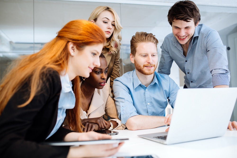 Creative business people brainstorming Deciding on a travel booking platform
