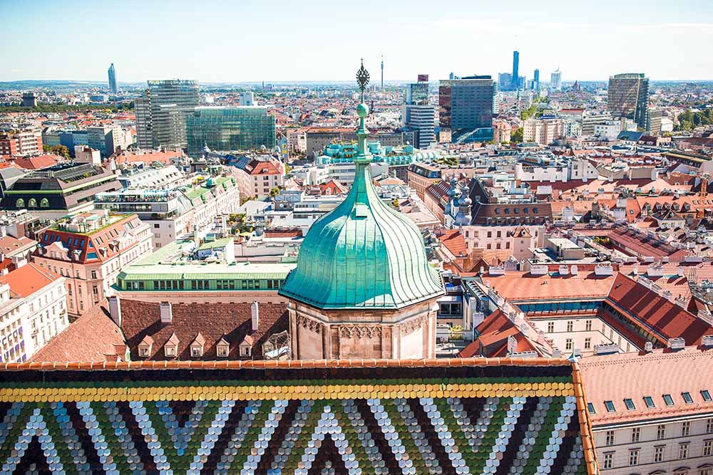 View from St. Stephen's Cathedral over Stephansplatz square in Vienna, capital of Austria on sunny day Vienna train travel
